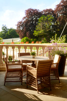 CoworthPark-DrawingRoom- Summer terraceeveningoverlookingfields-DorchesterCollection _2_